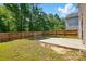 The backyard features a privacy fence, a grassy area, and a concrete patio at 6430 Matlea Ct, Charlotte, NC 28215