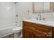 Updated bathroom with new vanity, tub, subway tile surround, and a modern fixtures at 6430 Matlea Ct, Charlotte, NC 28215