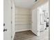 Walk-in pantry featuring wire shelving for optimal organization and easy kitchen access at 6430 Matlea Ct, Charlotte, NC 28215