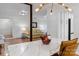 Dining room with modern table and views of the adjacent living room at 6719 Woodshed Cir, Charlotte, NC 28270