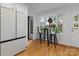 Eat in kitchen with stainless refrigerator and breakfast nook offering natural light at 6719 Woodshed Cir, Charlotte, NC 28270