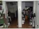 Hallway view through two open doors to bedroom with bed and side tables, plus adjacent room at 6813 Navajo Trl, Sherrills Ford, NC 28673