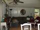 Charming living area with a ceiling fan, comfortable seating, and a view of the outdoors at 6813 Navajo Trl, Sherrills Ford, NC 28673