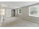 Spacious bedroom with carpet, two windows and a closet, perfect for relaxing and storage at 7016 Wannamaker Ln, Charlotte, NC 28226