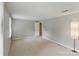 This bedroom features neutral walls, plush carpet, and a well-lit interior, creating a serene and inviting space at 7016 Wannamaker Ln, Charlotte, NC 28226