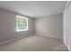 Bedroom with carpet, natural light and ample space for comfort and relaxation at 7016 Wannamaker Ln, Charlotte, NC 28226