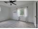 Spacious bedroom featuring neutral walls, gray carpet, and a window with sheer curtains at 85 Sw Myrtle Sw Ave, Concord, NC 28025