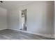 View of a living room with laminate flooring at 85 Sw Myrtle Sw Ave, Concord, NC 28025