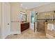 Bathroom featuring a tiled shower, vanity with wood cabinets, and tile flooring at 8904 Woodhall Lake Dr, Waxhaw, NC 28173