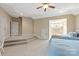 Large carpeted bedroom with two beds and a unique tiered platform at 8904 Woodhall Lake Dr, Waxhaw, NC 28173