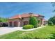 Luxury home showcases beautiful stone work, a four car garage, and manicured landscaping at 8904 Woodhall Lake Dr, Waxhaw, NC 28173