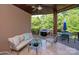 Outdoor patio with comfortable seating, a grill, and a dining area at 8904 Woodhall Lake Dr, Waxhaw, NC 28173