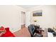 Bedroom with a sitting area and a decorative display piece on the wall at 11701 Brockley Ct, Charlotte, NC 28215