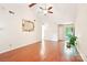Bright living room with hardwood floors, a ceiling fan, and an inviting atmosphere at 11701 Brockley Ct, Charlotte, NC 28215