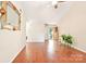 Bright living room features hardwood floors and an open layout, perfect for entertaining at 11701 Brockley Ct, Charlotte, NC 28215