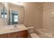 Bathroom featuring a vanity with a sink, toilet, and bathtub with shower at 118 Barnhardt Loop, Mooresville, NC 28117