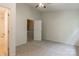 Bright bedroom with a ceiling fan and access to the bathroom at 118 Barnhardt Loop, Mooresville, NC 28117