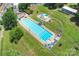 Aerial view of a community pool featuring a diving board and recreation areas at 1209 Leigh Ave, Charlotte, NC 28205