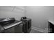 Laundry room featuring stainless steel washer and dryer at 1209 Leigh Ave, Charlotte, NC 28205