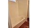 Bathroom with hardwood floors and a soaking tub at 14343 Arbor Ridge Dr, Charlotte, NC 28273