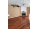 Spacious living room featuring hardwood floors, a fireplace, and plenty of natural light at 14343 Arbor Ridge Dr, Charlotte, NC 28273