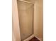 Enclosed shower with glass door and wood flooring, bathed in warm, inviting light at 14343 Arbor Ridge Dr, Charlotte, NC 28273