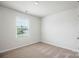 Bedroom featuring neutral carpet and a window with lovely view at 1554 Doran Ter, Richburg, SC 29729