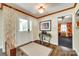 Inviting foyer featuring dark hardwood floors, a light-colored rug, and neutral walls at 16317 Terry Ln, Huntersville, NC 28078
