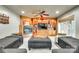 Cozy living room with a fireplace, built-in shelving, plush seating, and a warm ambiance for relaxation at 16317 Terry Ln, Huntersville, NC 28078