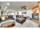 Spacious living room with fireplace, plush seating, and an open layout, perfect for entertaining guests at 16317 Terry Ln, Huntersville, NC 28078