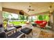 Comfortable outdoor patio with multiple seating arrangements and a lake view at 16317 Terry Ln, Huntersville, NC 28078