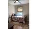 Inviting bedroom with a patterned quilt, natural light from the window, and hard surface floors at 1750 Sells Rd, Salisbury, NC 28144