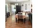 Cozy dining room with wood floors and ample space for entertaining guests at 1750 Sells Rd, Salisbury, NC 28144