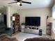Inviting living room with carpet flooring and a ceiling fan for comfortable living at 1750 Sells Rd, Salisbury, NC 28144