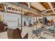 Unfinished basement featuring laundry area, painted walls, and open space for flexible usage and storage solutions at 1792 Hoffman Rd, Gastonia, NC 28054