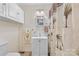 This bathroom is equipped with a vanity and shower with neutral colors at 1792 Hoffman Rd, Gastonia, NC 28054
