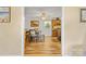 Cozy dining room with a wood table, view of the kitchen, and neutral color scheme at 1792 Hoffman Rd, Gastonia, NC 28054