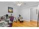 Comfortable office featuring hardwood floors, neutral walls, and a ceiling fan at 1792 Hoffman Rd, Gastonia, NC 28054