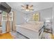 Beautiful main bedroom with an area rug, soft lighting, and a ceiling fan at 1792 Hoffman Rd, Gastonia, NC 28054