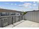 A spacious balcony with iron railings offers city views at 2013 Clarksdale Dr # 38, Charlotte, NC 28206