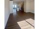 Spacious living room boasts natural light, hardwood floors, and open floor plan at 2013 Clarksdale Dr # 38, Charlotte, NC 28206