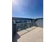 Spacious outdoor patio with railings overlooking the city skyline at 2013 Clarksdale Dr # 38, Charlotte, NC 28206