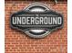 The Underground sign on a brick wall at 2013 Clarksdale Dr # 38, Charlotte, NC 28206