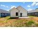 Spacious backyard showcasing the property's clean white siding and modern architecture at 213 Benfield Rd, Kings Mountain, NC 28086