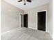 Comfortable bedroom with neutral carpet and two entry doors, providing easy access at 213 Benfield Rd, Kings Mountain, NC 28086