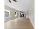 Bright and spacious living room featuring modern vinyl floors and abundant natural light from large windows at 213 Benfield Rd, Kings Mountain, NC 28086