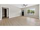 Open living area with light wood floors, ample natural light, and a view to the outdoors at 213 Benfield Rd, Kings Mountain, NC 28086