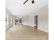 Open-concept living room featuring hardwood flooring and abundant natural light at 213 Benfield Rd, Kings Mountain, NC 28086