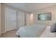 Bedroom with neutral tones, carpet, and two closets for plenty of storage at 2209 Sumner Green Ave # M, Charlotte, NC 28203