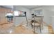 Cozy dining area located between the kitchen and living space at 2209 Sumner Green Ave # M, Charlotte, NC 28203